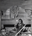 Child who lives in an alley dwelling near the capitol.