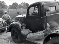 cowboy asleep on running board